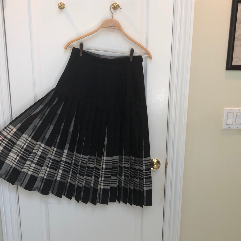 Two skirts in one black plaid from London